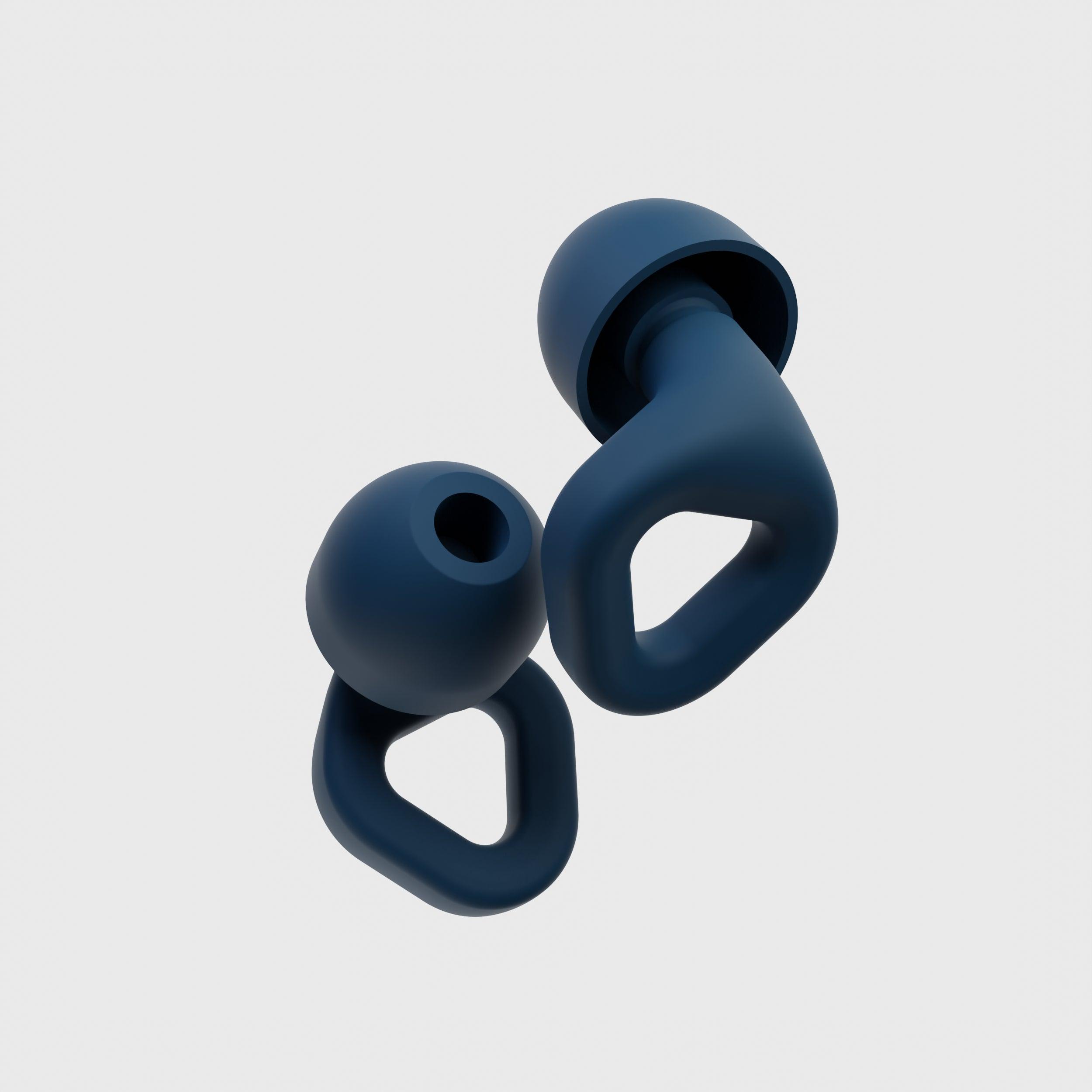 Close-up of Zenz Unwind navy blue silicone earplugs showcasing their ergonomic design and superior noise-canceling features